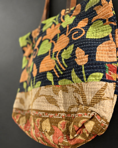 Bolsas 'Kantha' con asas de cuero