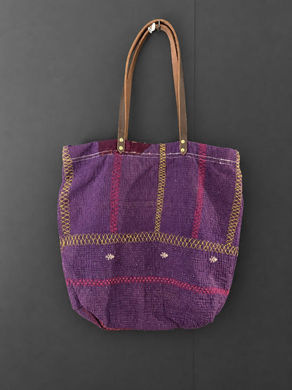 Bolsas 'Kantha' con asas de cuero